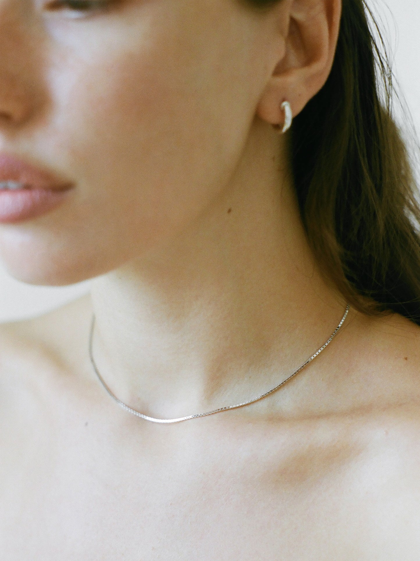 Model wearing Laura Lombardi White Gold Box Chain Necklace