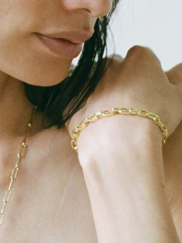 Model wearing Laura Lombardi gold Catena Bracelet