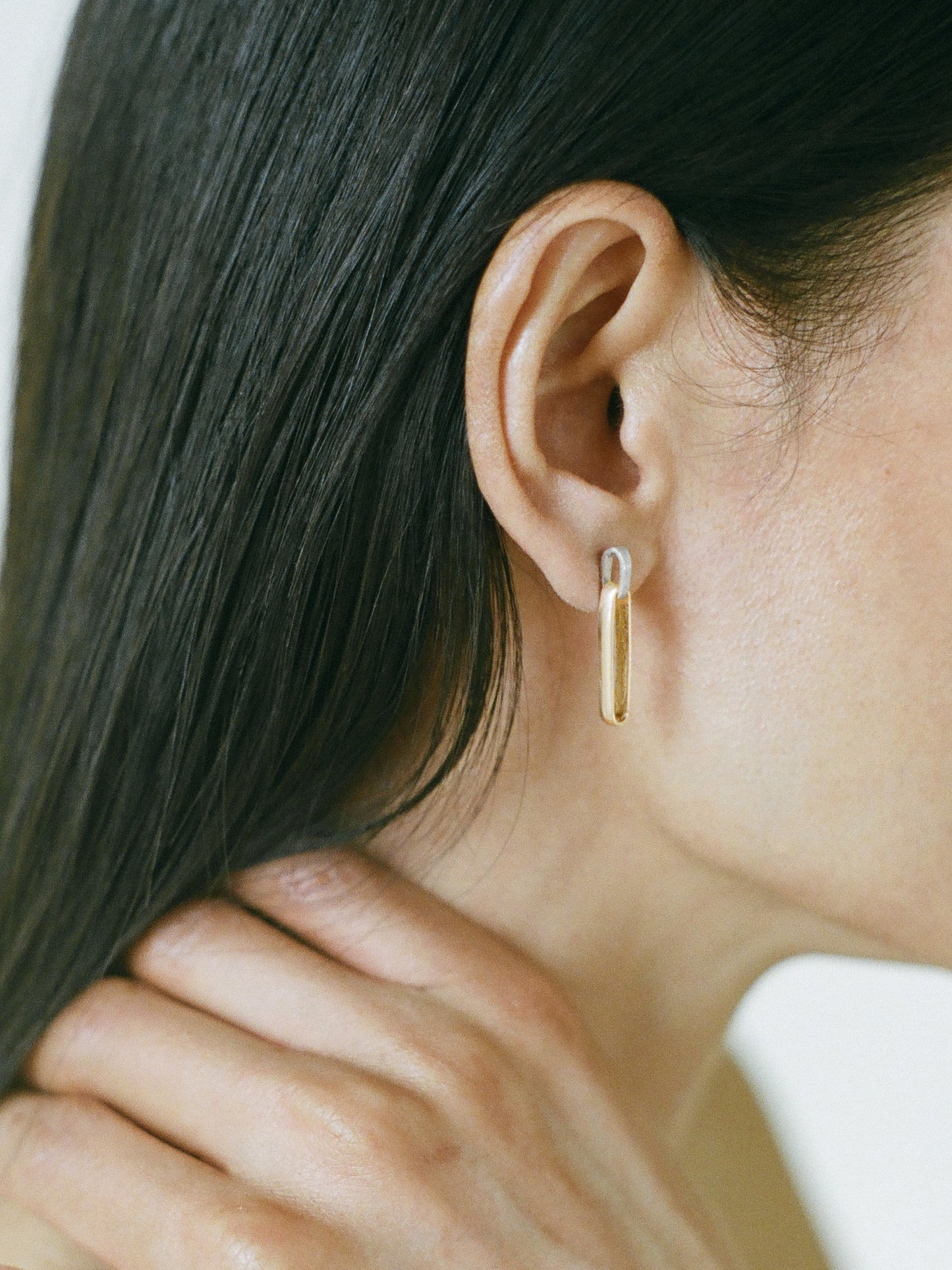 Model wearing Laura Lombardi Two Tone Chiusa Earrings