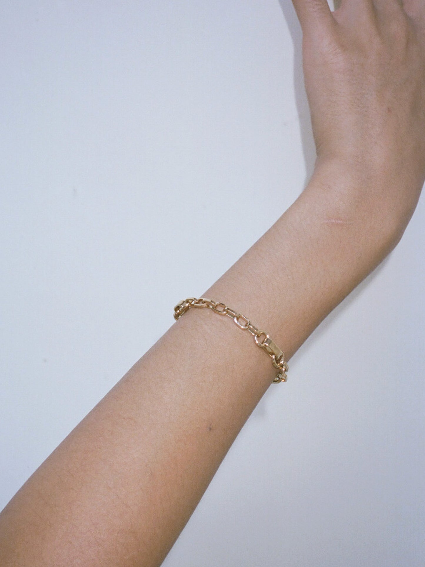 Model wearing Laura Lombardi gold Centa Bracelet