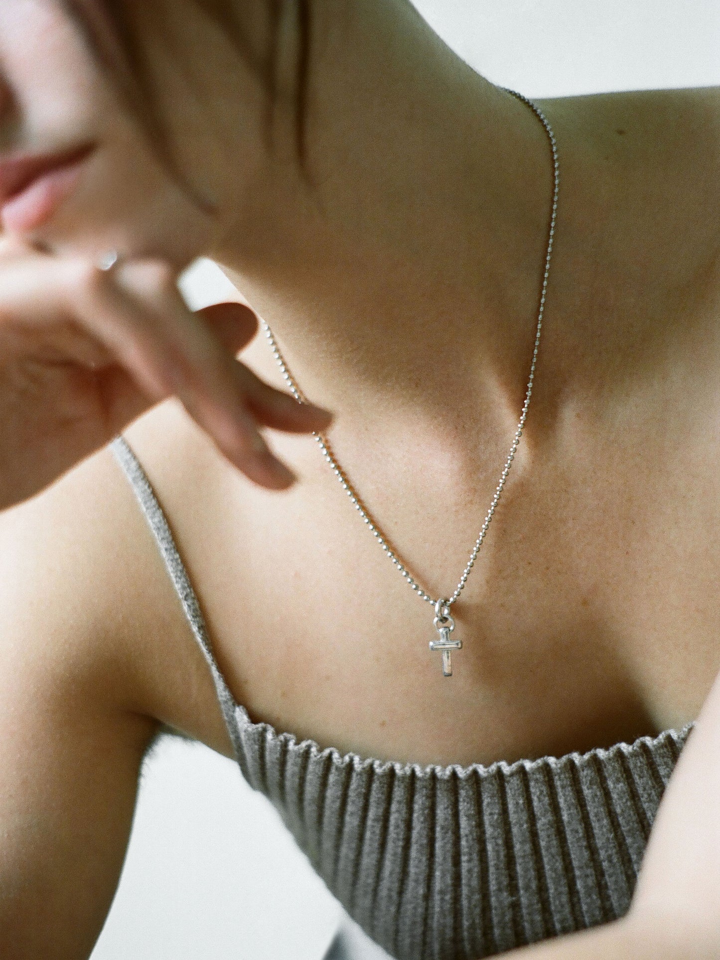 Model wearing Laura Lombardi Silver Mini Cecilia Pendant