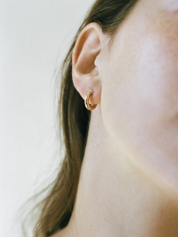 Model wearing Laura Lombardi Yellow Gold Mini Classica Hoops