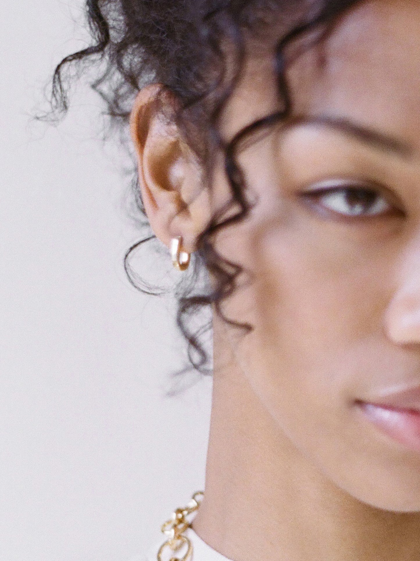 Model wearing Laura Lombardi Mini Fissa Earrings