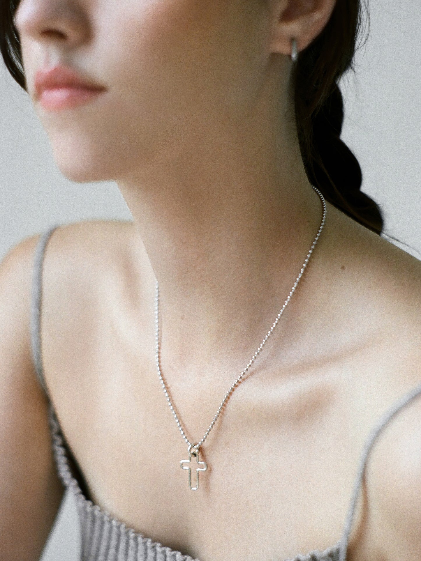 Model wearing Laura Lombardi Silver Mini Madda Pendant