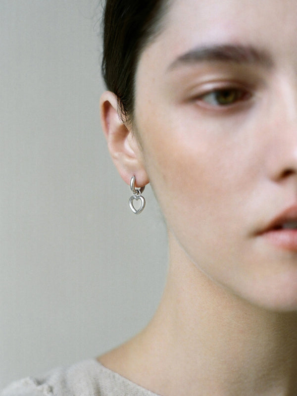 Model wearing Laura Lombardi Silver Mini Teresa Earrings