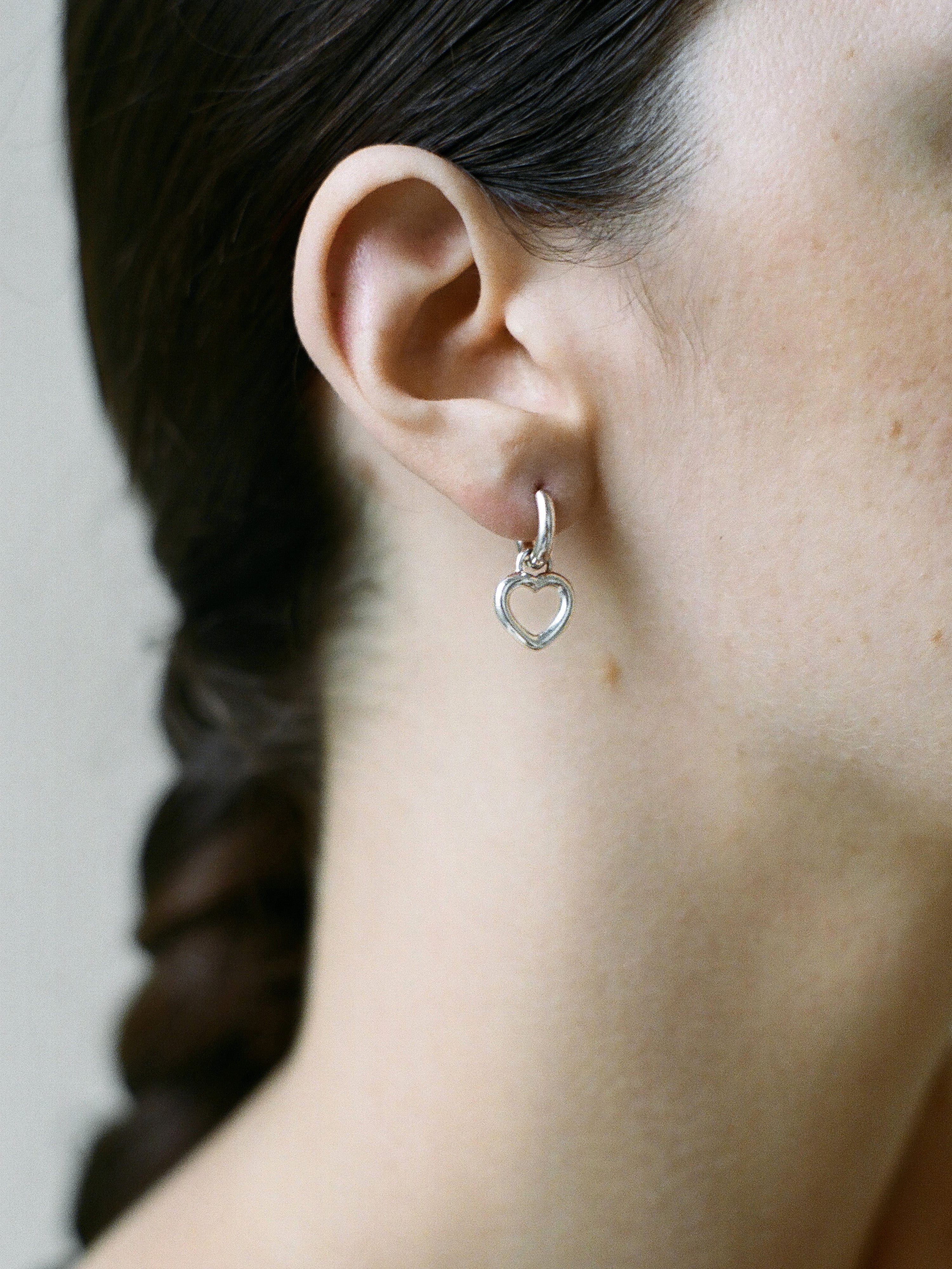 Model wearing Laura Lombardi Silver Mini Teresa Earrings