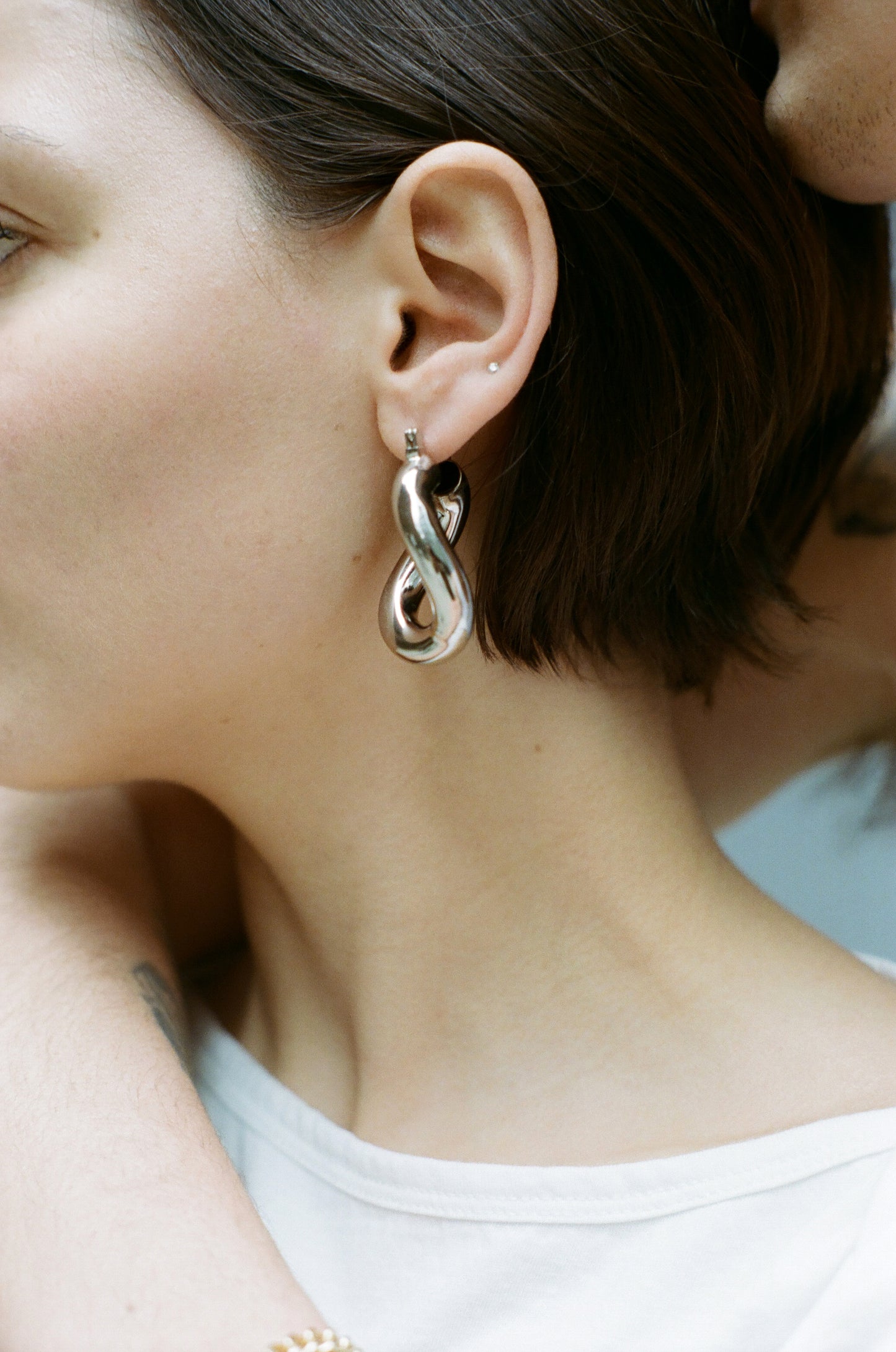 Model wearing Laura Lombardi Silver Anima Earrings