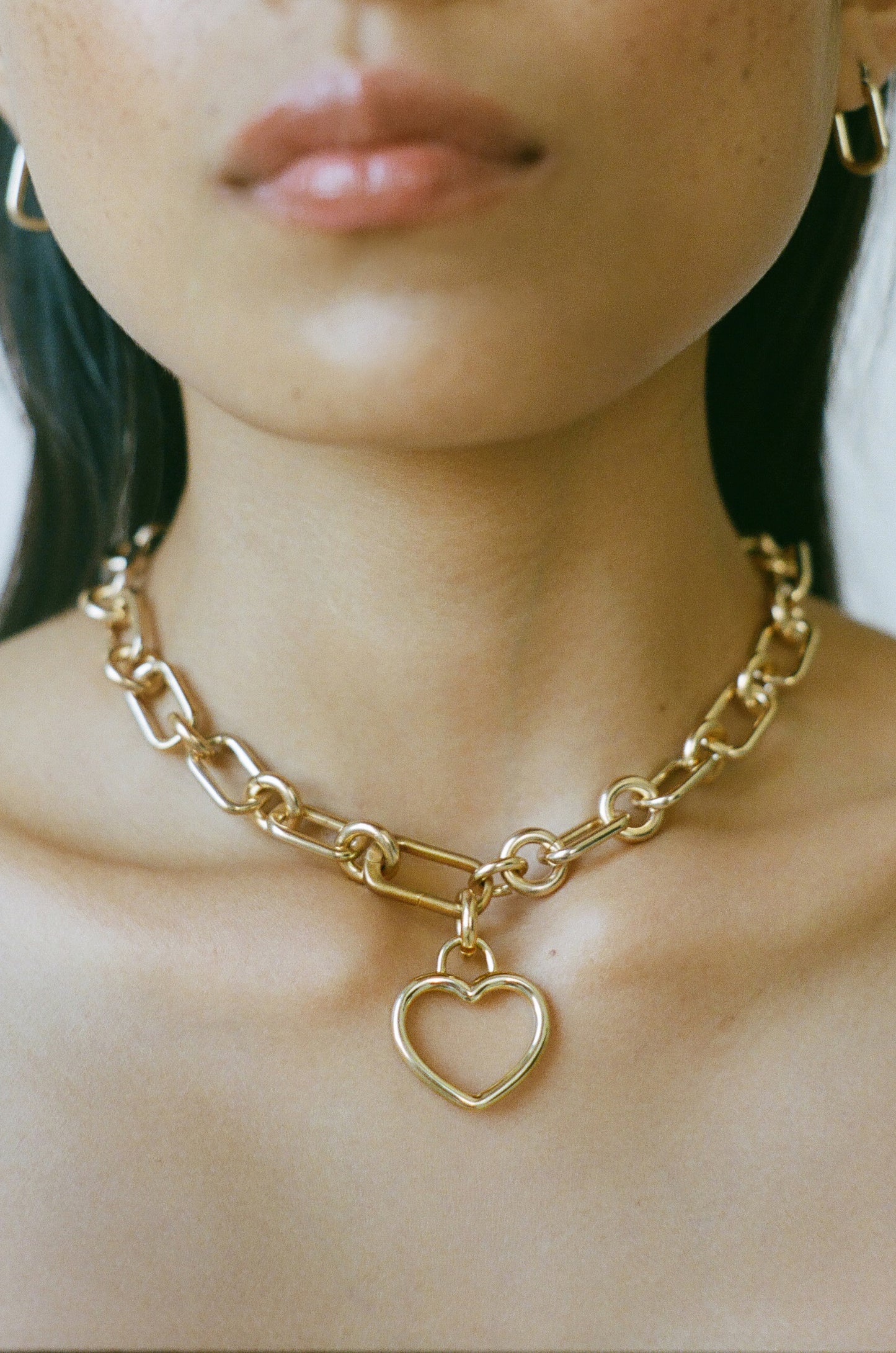 Model wearing Laura Lombardi gold Beatta heart Necklace